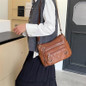 Vintage-Inspired Women's Shoulder Bag - Large Capacity, Synthetic Faux Leather, Adjustable Strap, Multiple Pockets, Zipper Closure - Perfect for Daily Commute, Work, Travel - Includes Cosmetic Bag | Travel Bag | Vintage-Inspired Purse — image 25 of 25