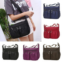 Multi compartment messenger bag women's waterproof Oxford cloth single shoulder bag leisure light middle-aged and elderly mother bag business collection Wallet — image 2 of 21